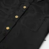 Barnkjol i jacquardsatin med plissering Barnkjol i jacquardsatin med plissering