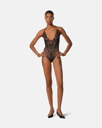 Broderad bodysuit med spetsar