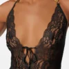 Broderad bodysuit med spetsar Broderad bodysuit med spetsar