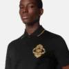 Broderad polo i barockstil Broderad polo i barockstil