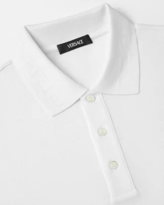 Broderad polo i bomullspiqué