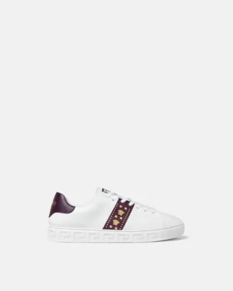 Greca-smyckade sneakers