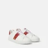 Greca-smyckade sneakers