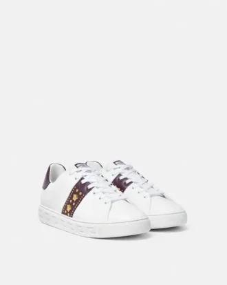 Greca-smyckade sneakers