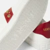 Greca-smyckade sneakers