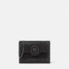 La Medusa-prydd satin-clutch La Medusa-prydd satin-clutch