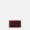 Medusa 95 Croc-Effect Clutch Medusa 95 Croc-Effect Clutch