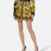 Plisserad minikjol i tryckt silkes-twill Plisserad minikjol i tryckt silkes-twill