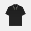 Top i satin med nitar
